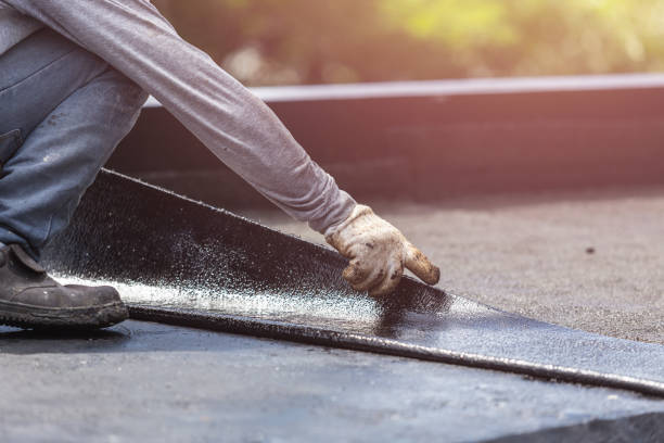 Professional Basement Waterproofing technician working in Ada, MI